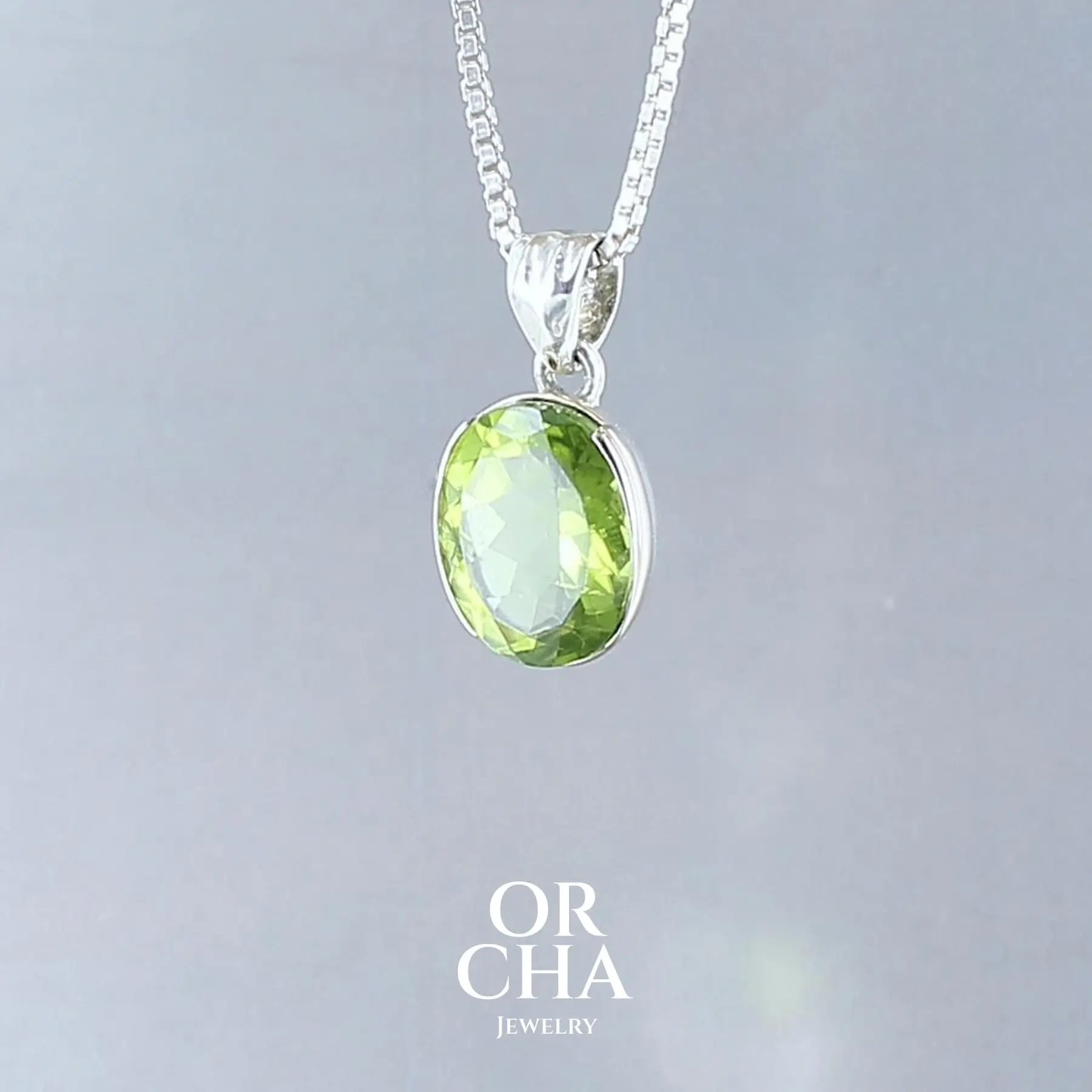 Pendentif en argent et or avec Péridot - Paradis