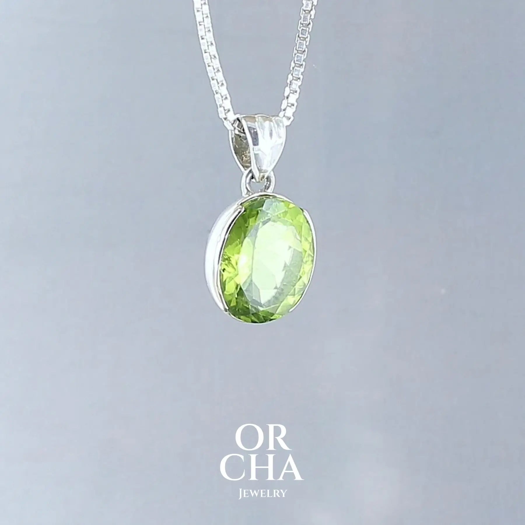 Pendentif en argent et or avec Péridot - Paradis
