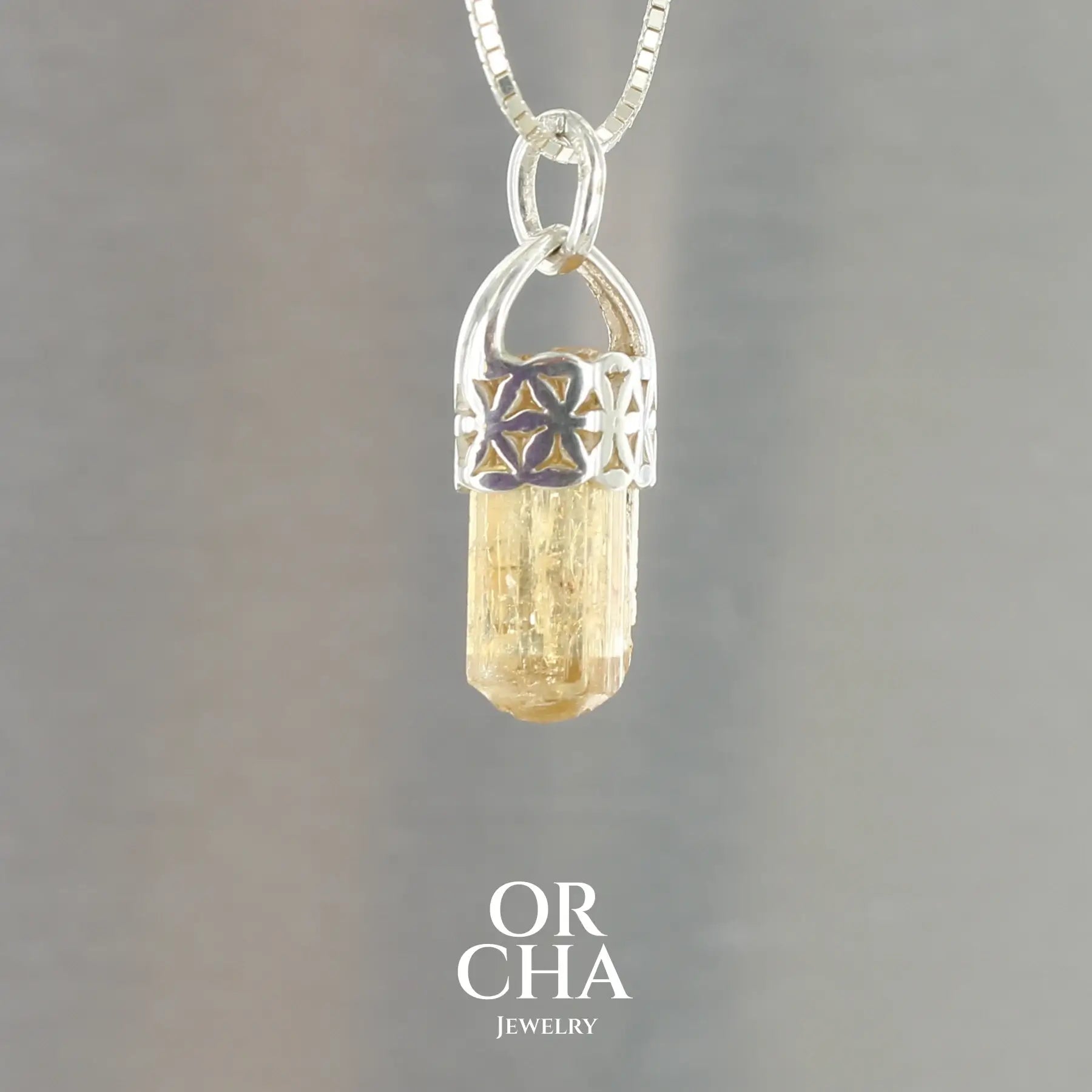 Pendentif fleur de vie en argent avec Cristal de Topaze Impériale - Sauvage