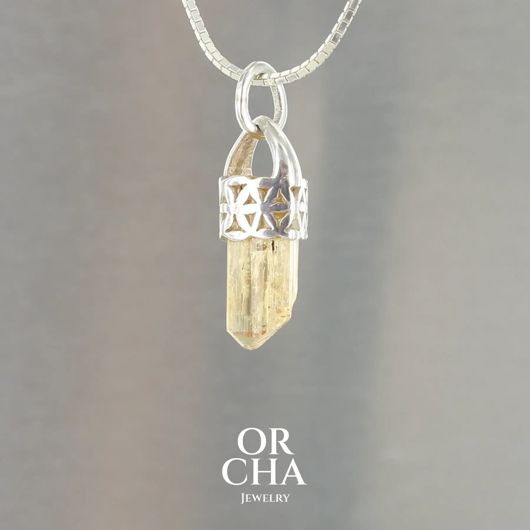 Pendentif fleur de vie en argent avec Cristal de Topaze Impériale - Sauvage