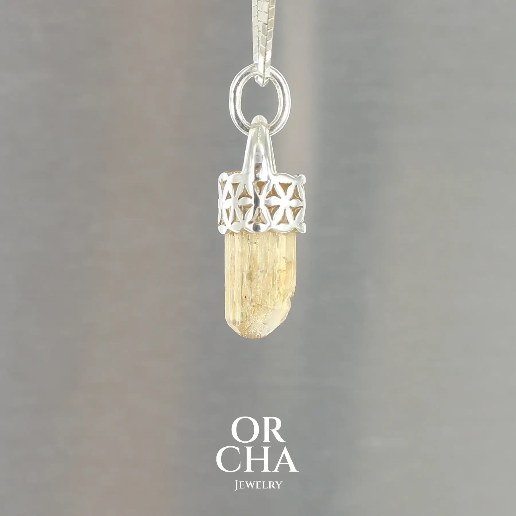 Pendentif fleur de vie en argent avec Cristal de Topaze Impériale - Sauvage