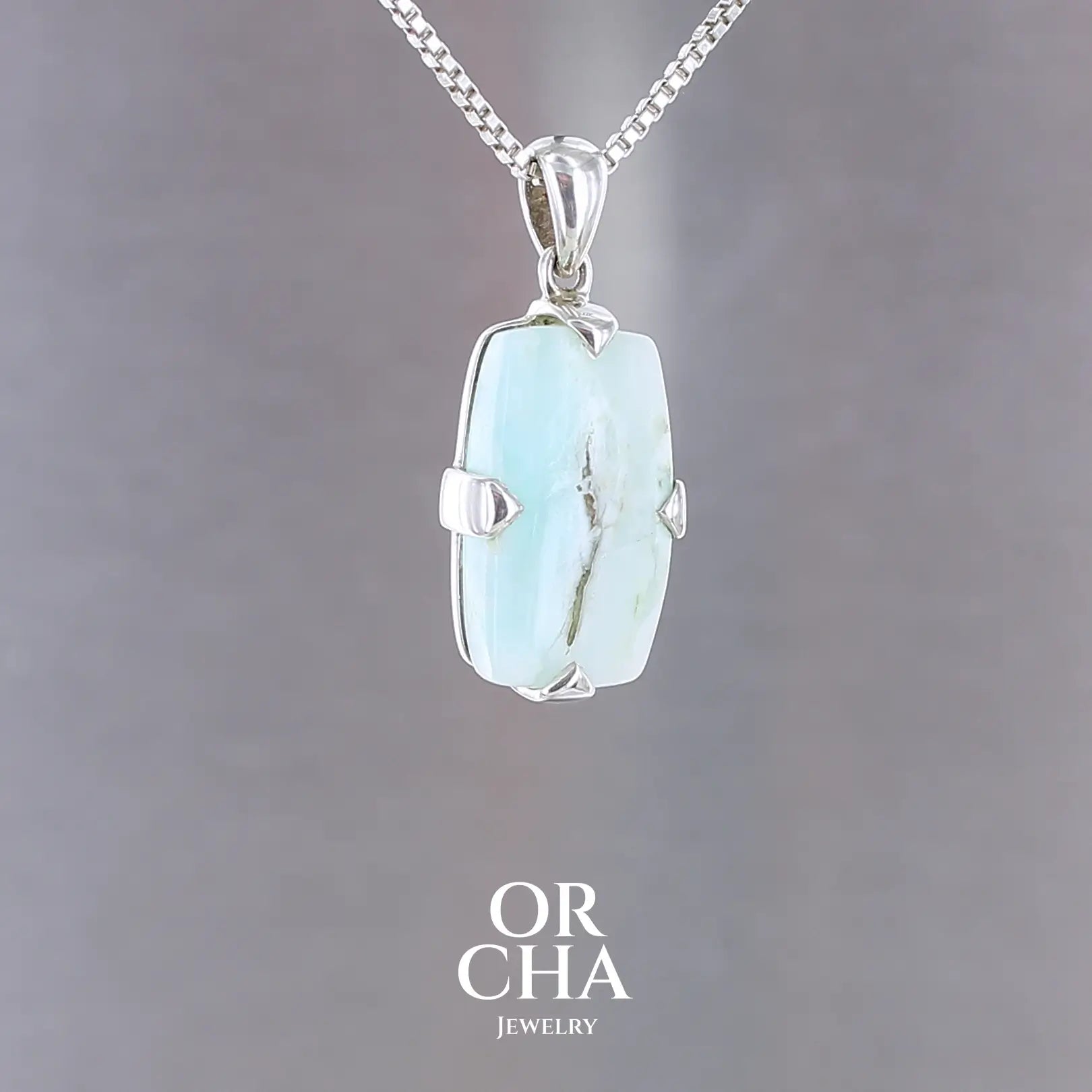 Pendentif en argent avec Opale bleue - Essential
