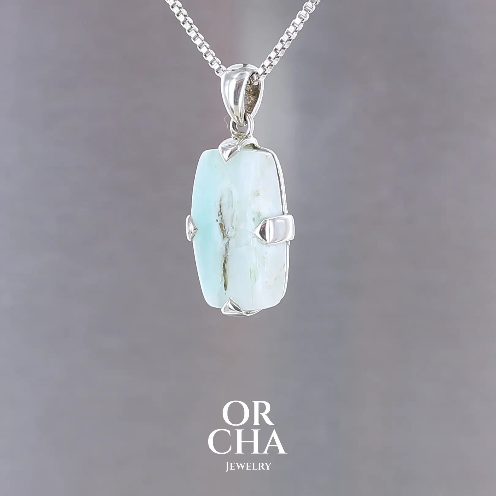 Pendentif en argent avec Opale bleue - Essential