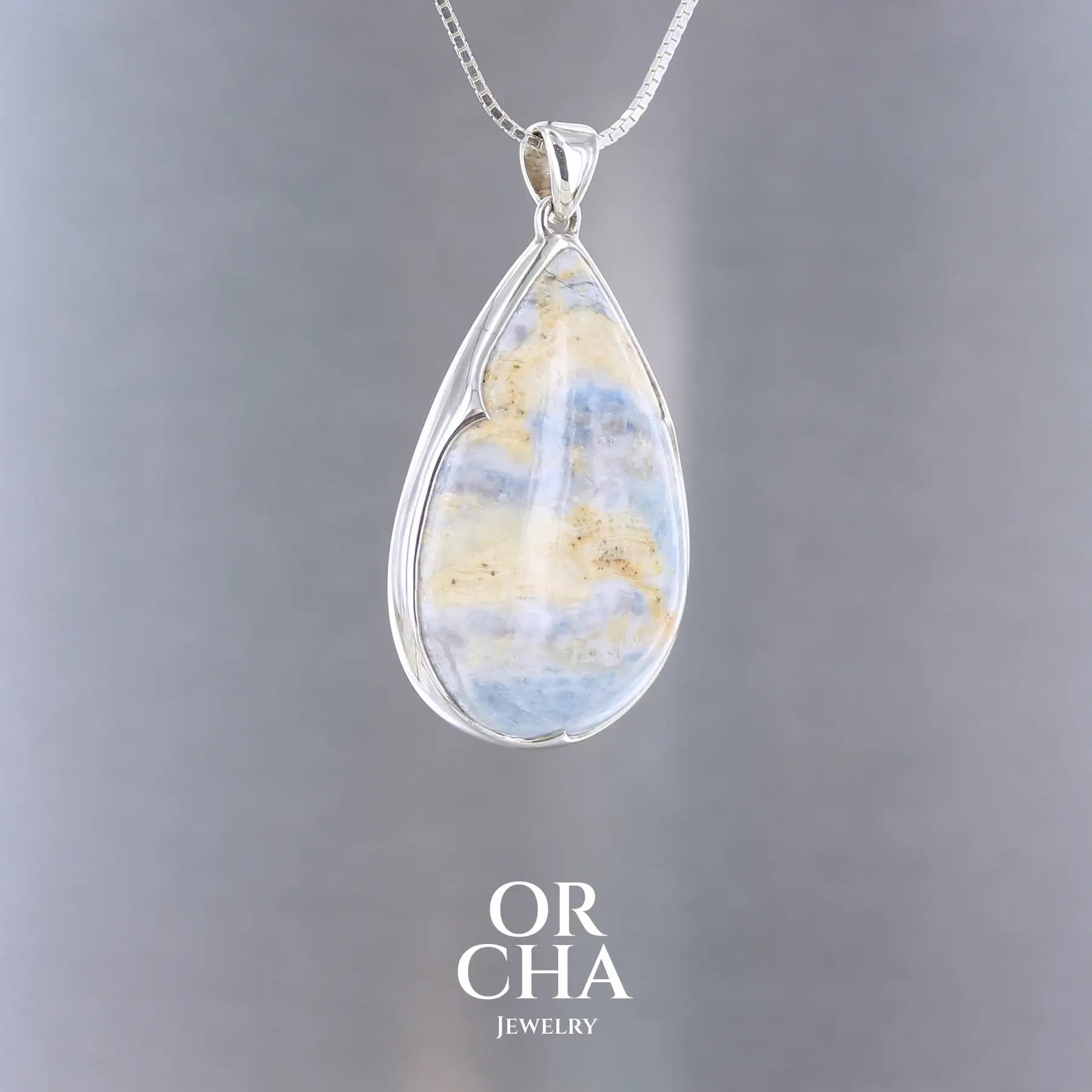 Pendentif en argent avec Scheelite - Orcha