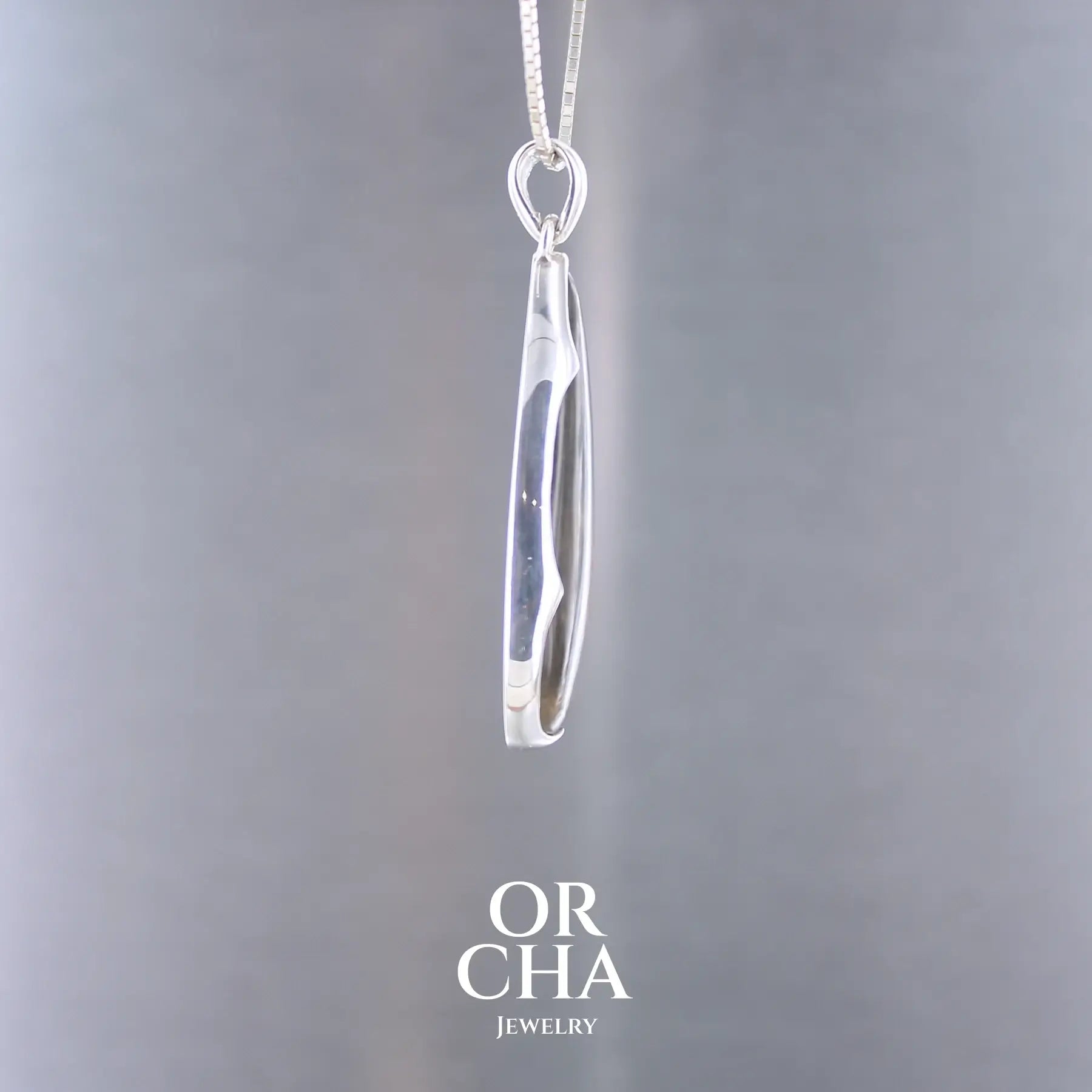 Pendentif en argent avec pierre de soleil noire - Orcha