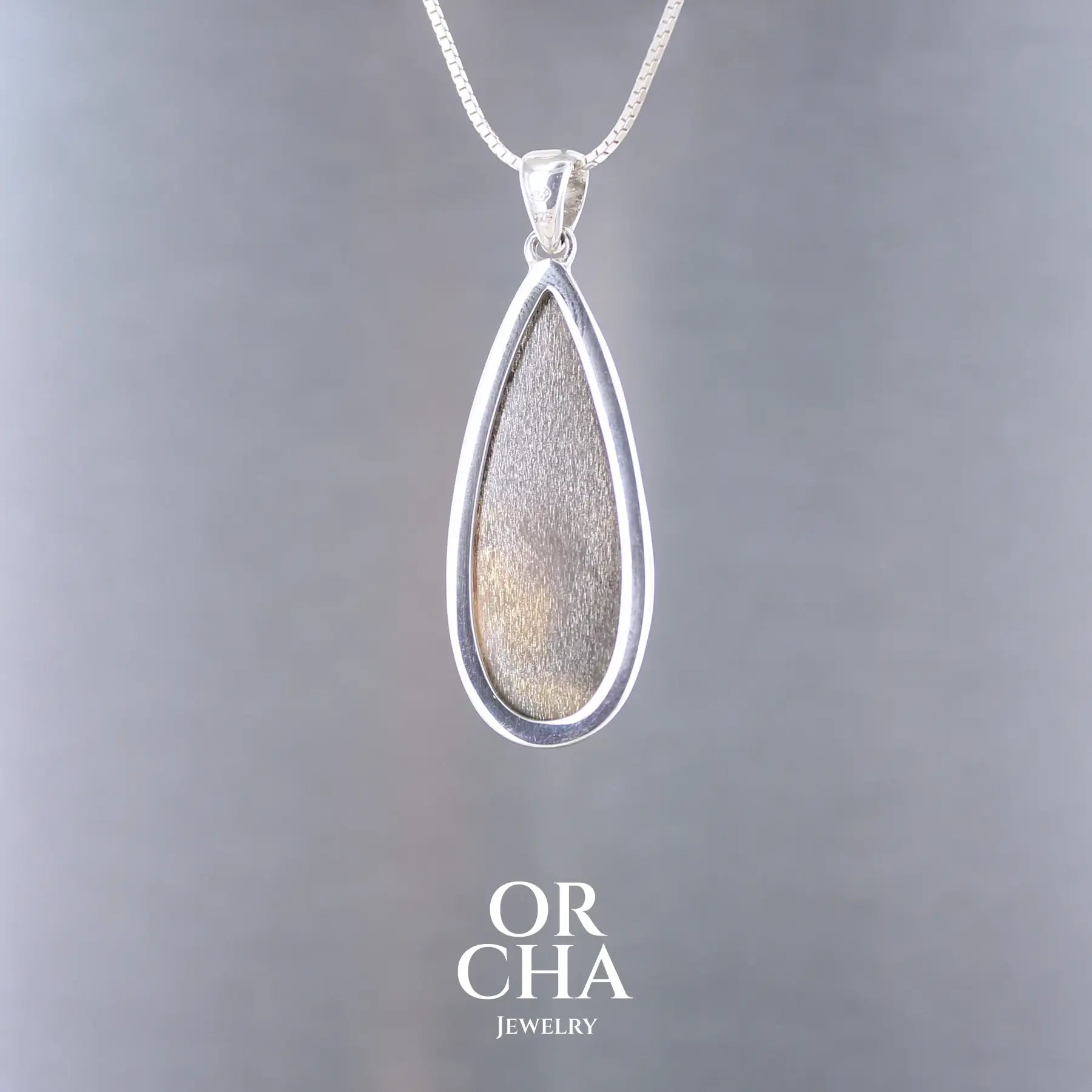 Pendentif en argent avec pierre de soleil noire - Orcha