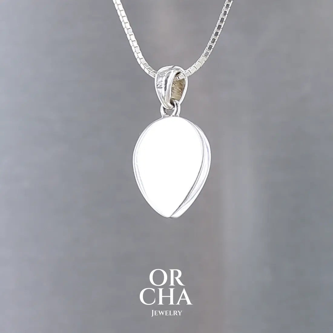 Pendentif en argent avec Topaze bleue - Essential