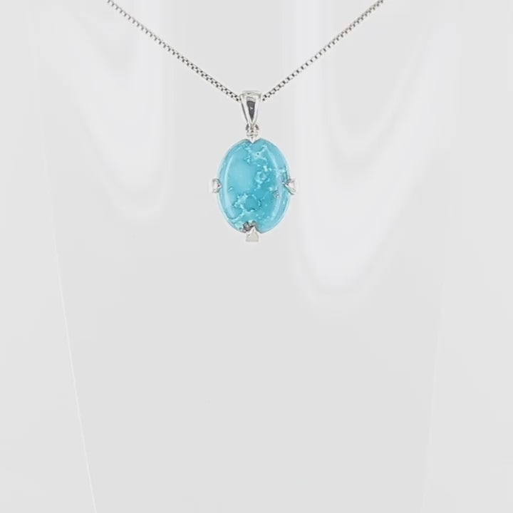 Pendentif pour homme et femme en argent massif serti d'une Turquoise véritable. Pierre cabochon de forme ovale serti de griffe. Bijoux unique, éthique et durable présenté dans un coffret de notre marque, prêt à offrir. Livraison offerte, certificat d'authenticité, service client