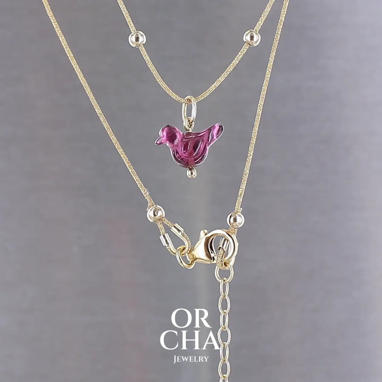 Collier Oiseau en or 18k et Tourmaline rouge violacée - Orcha's Gold