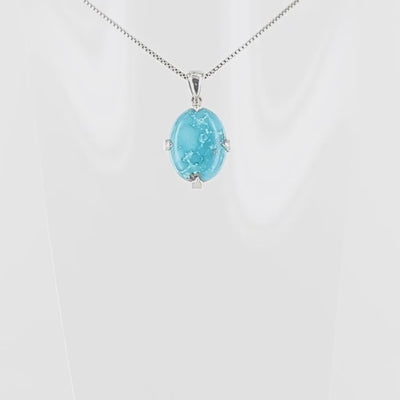 Pendentif pour homme et femme en argent massif serti d'une Turquoise véritable. Pierre cabochon de forme ovale serti de griffe. Bijoux unique, éthique et durable présenté dans un coffret de notre marque, prêt à offrir. Livraison offerte, certificat d'authenticité, service client